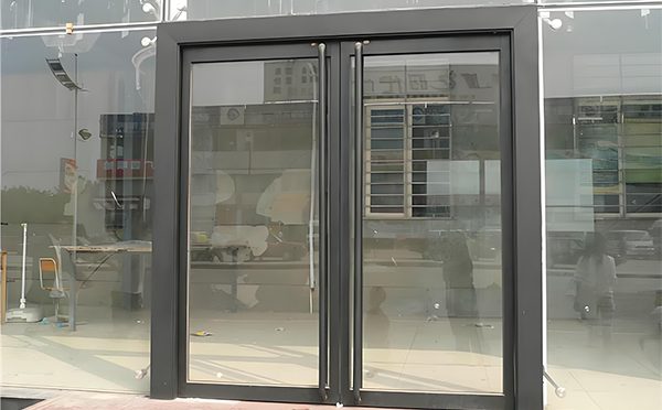 伊犁玻璃地弹门